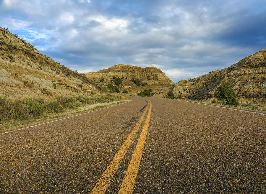 Road Through The Badlands Photograph by Dan Sproul