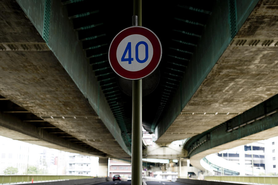 Road traffic sign of road under highway Photograph by Air Rabbit