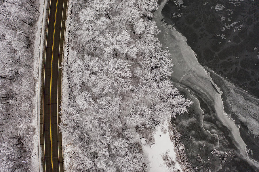 Road Trees and Lake in Winter  Photograph by John McGraw