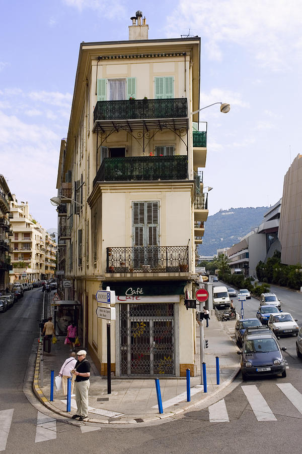 Roads passing along a cafe, Nice, France Photograph by Glowimages