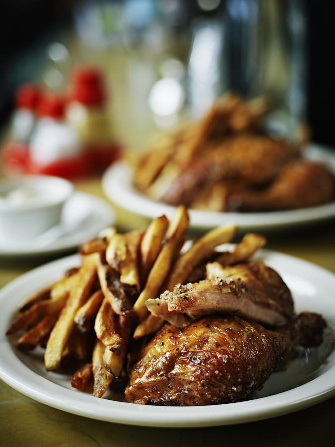 Roasted free range chicken, fried potatoes Photograph by Thomas Barwick