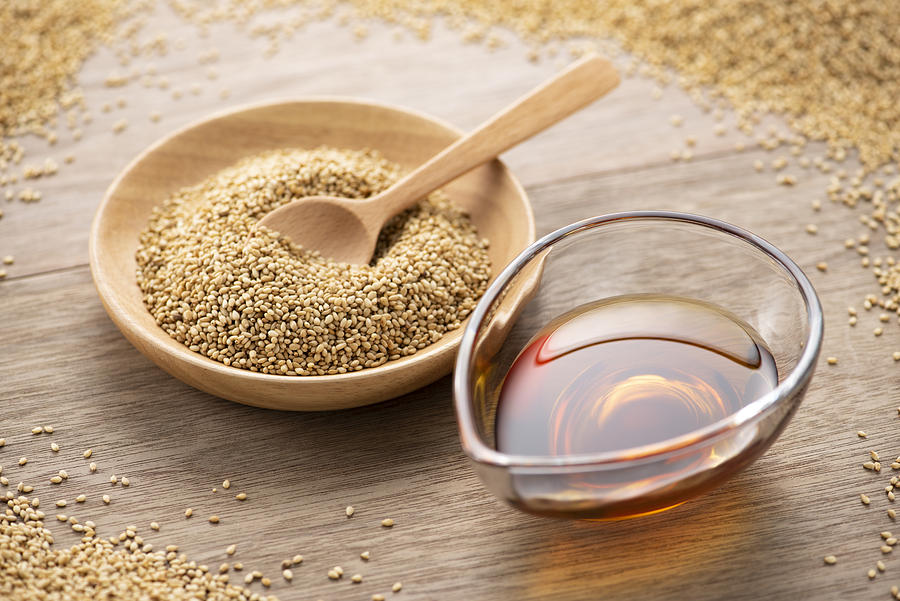 Roasted sesame seeds and sesame oil Photograph by Kuppa_rock