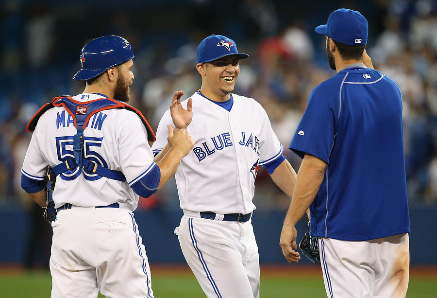 Roberto Osuna, Russell Martin, and Chris Colabello Photograph by Tom Szczerbowski