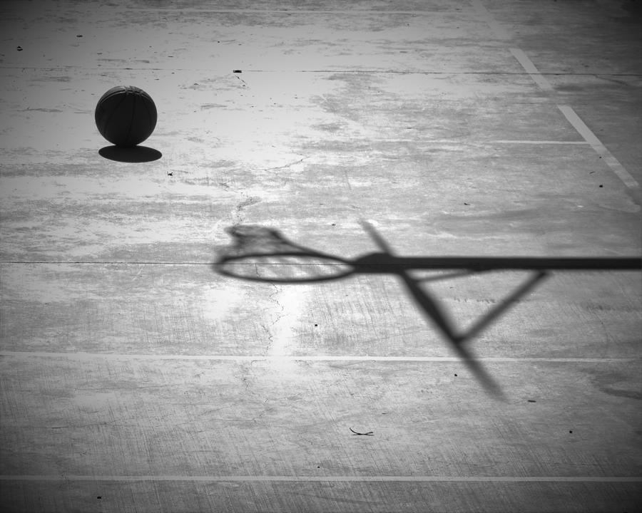 Rock and Hoop Shadow Photograph by Bill Tomsa