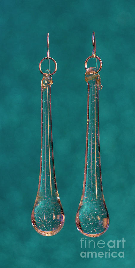 Rock crystal teardrop earrings from antique lamps glittering Photograph by Pablo Avanzini
