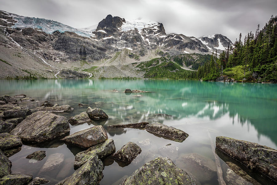 Rock hopping on the shoreline of Upper Joffre Lake Photograph by Pierre Leclerc Photography