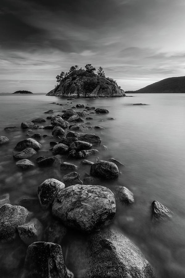 Rock Hopping At High Tide In Black And White Photograph