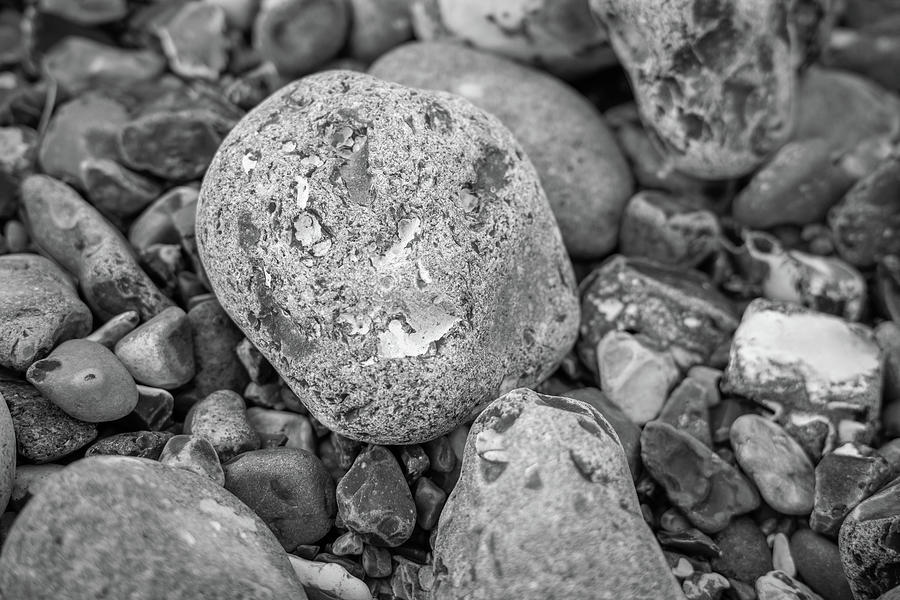 Rock on pebble beach Photograph by Chris Yaxley