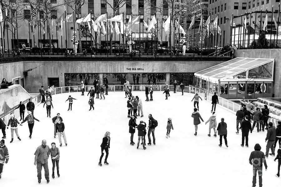 Rockefeller Center Ice Skating in New York City Photograph by John Rizzuto