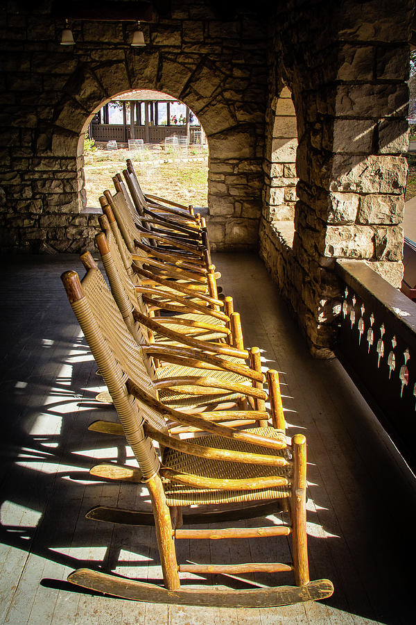 Rocking chairs on the El Tovar porch Photograph by Craig A Walker