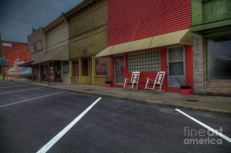 Architecture Photograph - Rocking Chairs on the Sidewalk  by Larry Braun