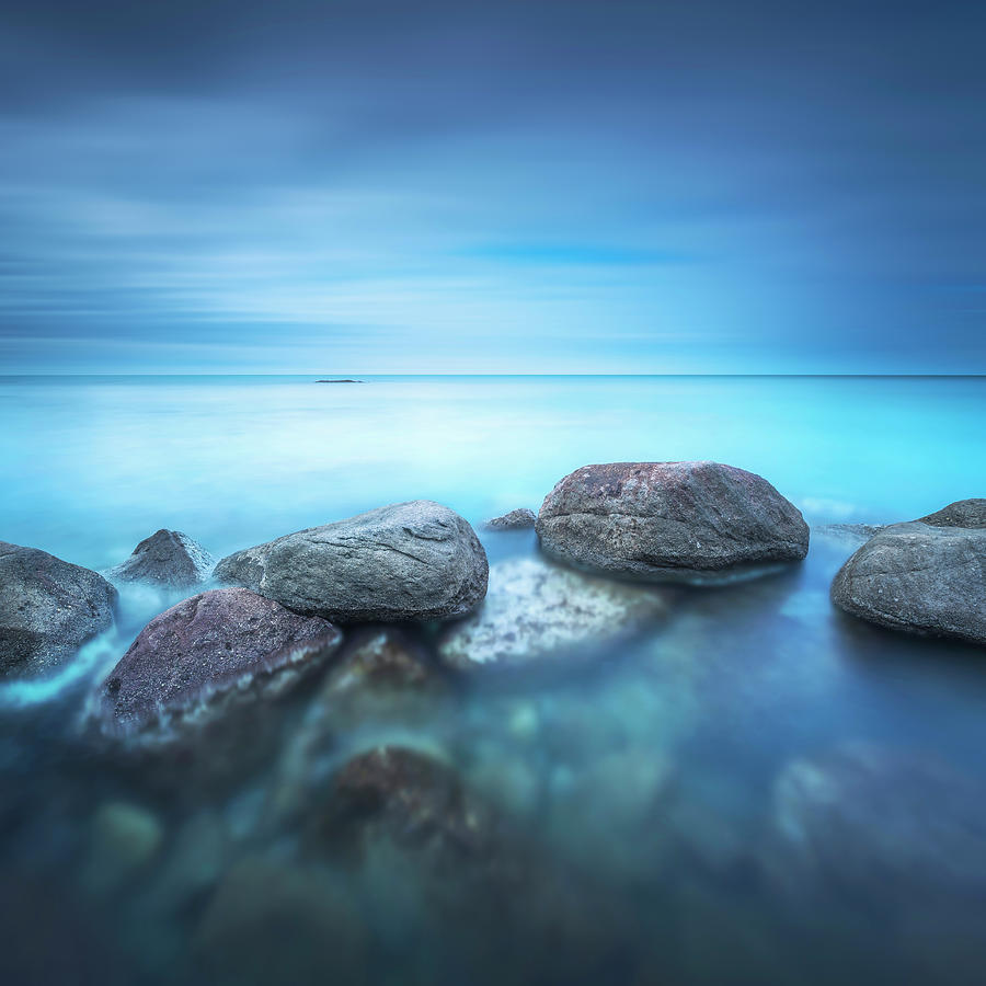 Rocks and sea, blue abstract. Photograph by Stefano Orazzini