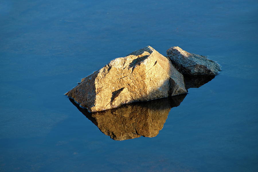 Rocks are reflected in the glassy water of a coastal puddle Photograph by Ulrich Kunst And Bettina Scheidulin