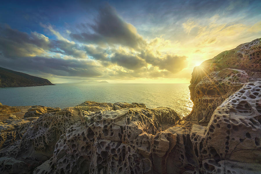 Rocks eroded by the wind in Populonia cliff Buca delle Fate Photograph by Stefano Orazzini