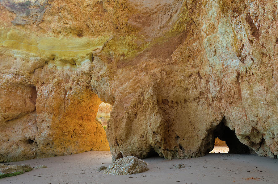 Rocky Doors in Three Brothers beach. Algarve Photograph by Angelo DeVal