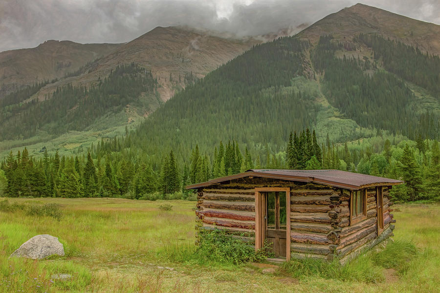 Rocky Mountain Retreat Photograph by Marcy Wielfaert