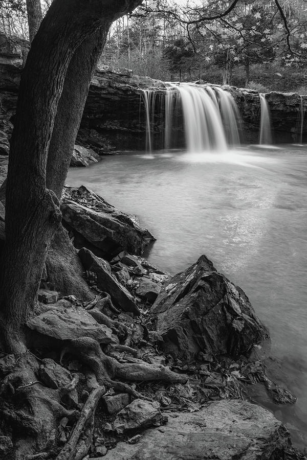 Black And White Photograph - Rocky Shores At Falling Water Falls - Black and White Edition by Gregory Ballos