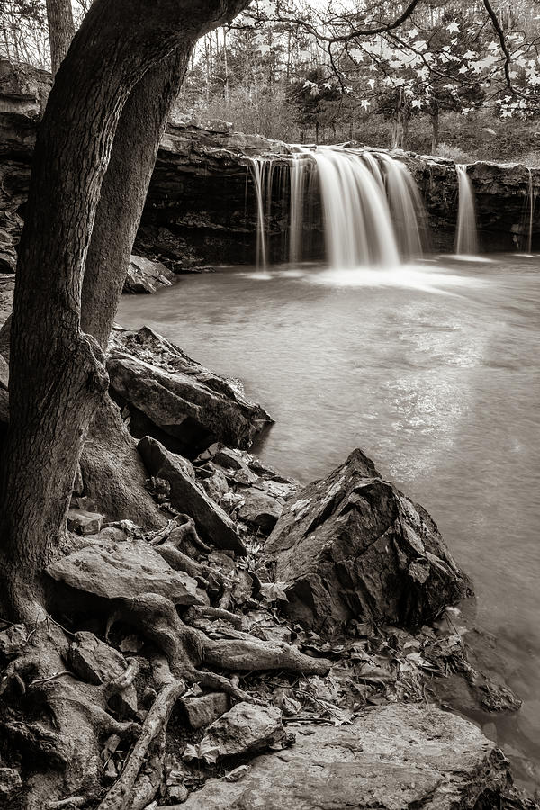 Rocky Shores At Falling Water Falls - Sepia Edition Photograph by Gregory Ballos