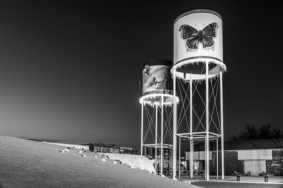 Rogers Arkansas Water Stop Towers At Dusk - Black And White Photograph by Gregory Ballos