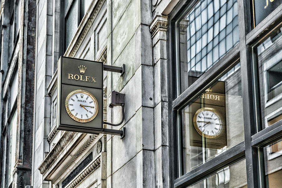 Rolex Street Clock Reflection Photograph by Sharon Popek