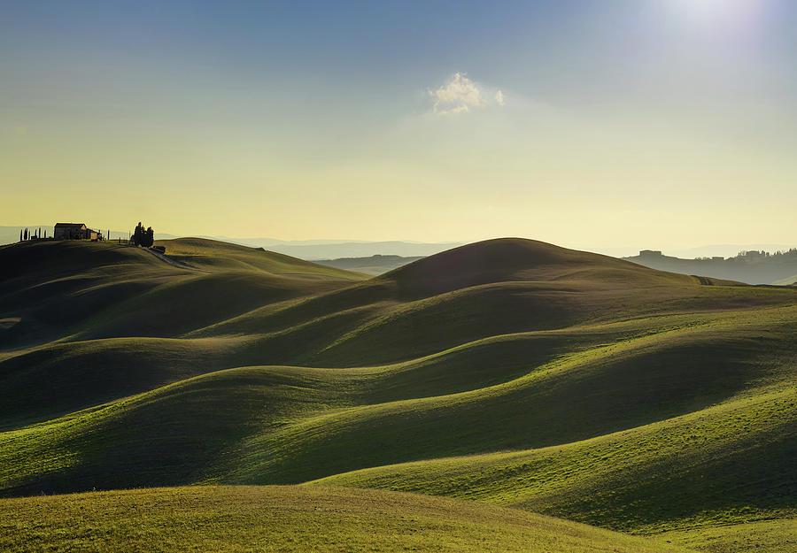 Rolling hills and farmland in Tuscany. Photograph by Stefano Orazzini