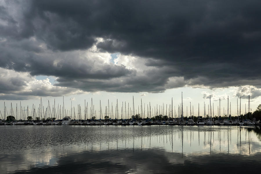 Rolling Storm - Wild Weather Skyscape over a Safe Marina Photograph by Georgia Mizuleva