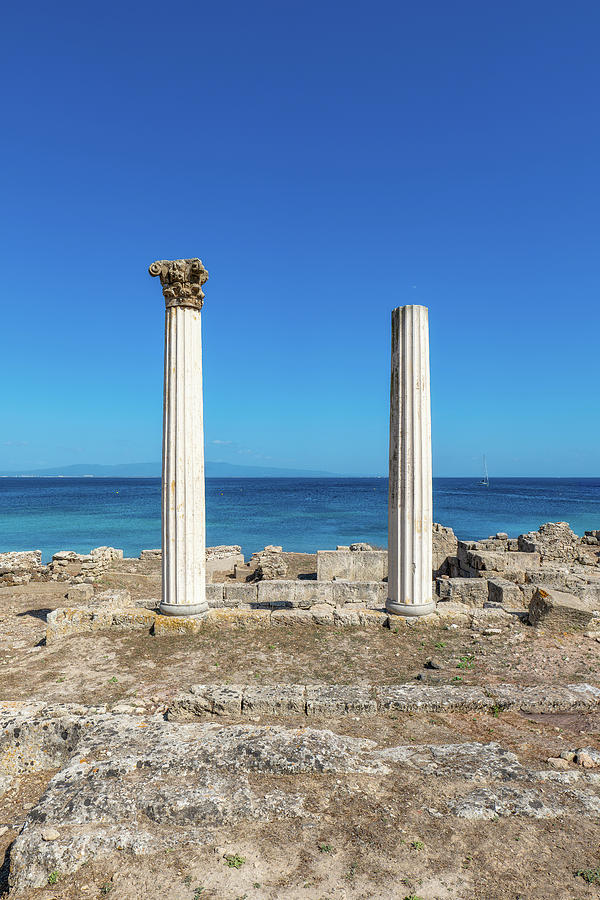 Roman Columns Against the Sardinian Horizon Photograph by Benoit Bruchez