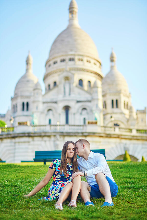 Romantic couple near Sacre-Coeur cathedral on Montmartre, Paris Photograph by Encrier