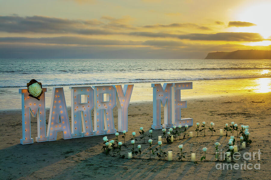Romantic proposal on the beach at sunset Photograph by Delphimages Photo Creations