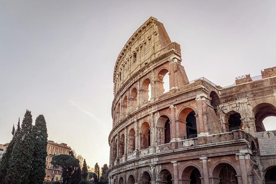 Rome and The Coliseum at sunrise Photograph by Benoit Bruchez