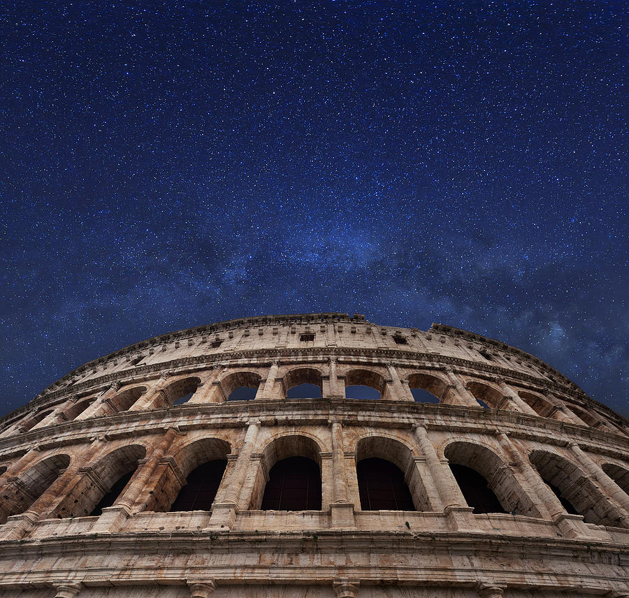 Rome coliseum and milky way in the midnight sky Photograph by Zorazhuang