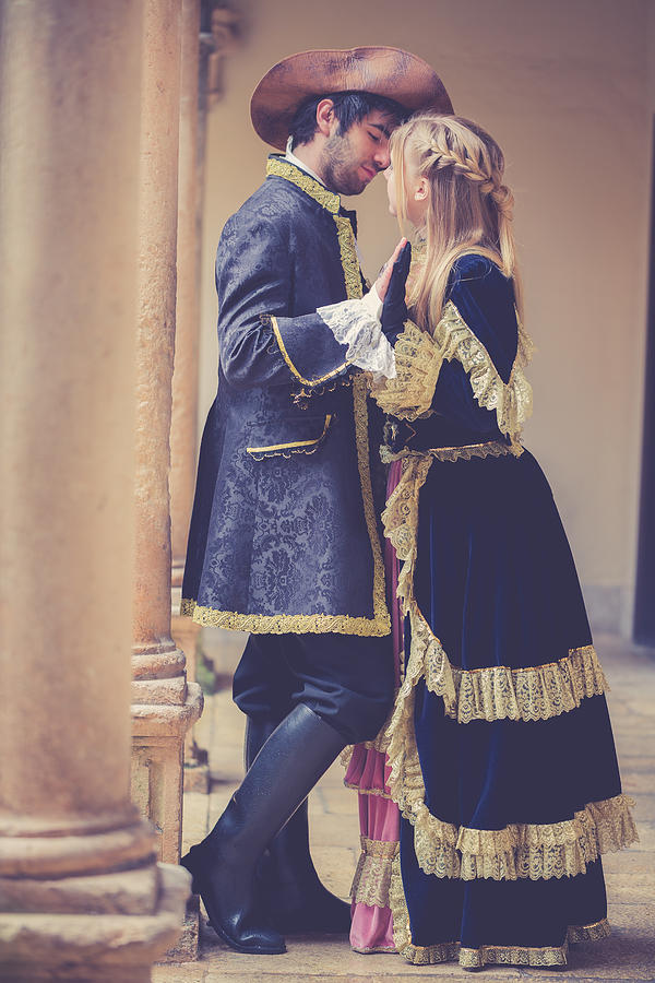 Romeo And Juliet Holding Hands At Balcony Photograph by DianaHirsch