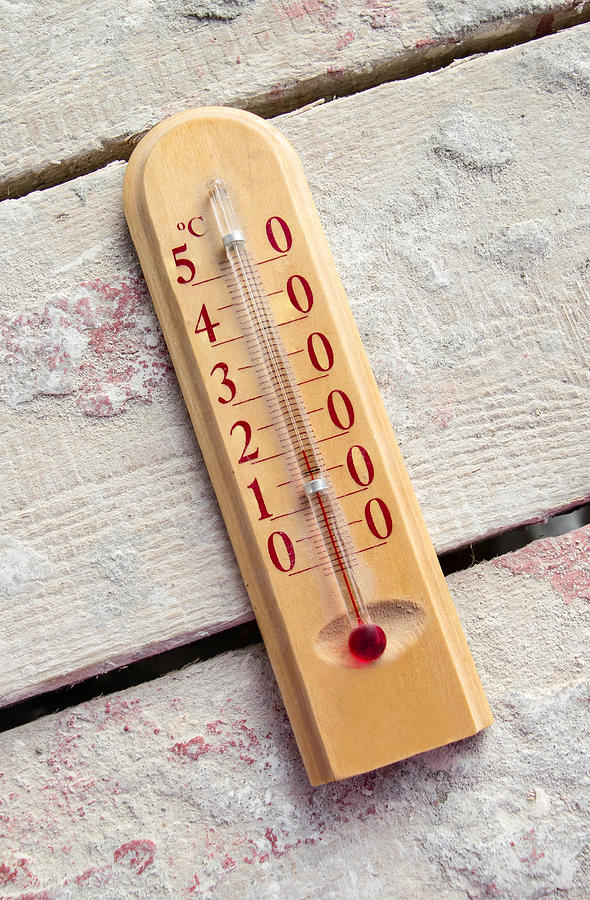 Room wooden thermometer on boards with cement Photograph by Photonew