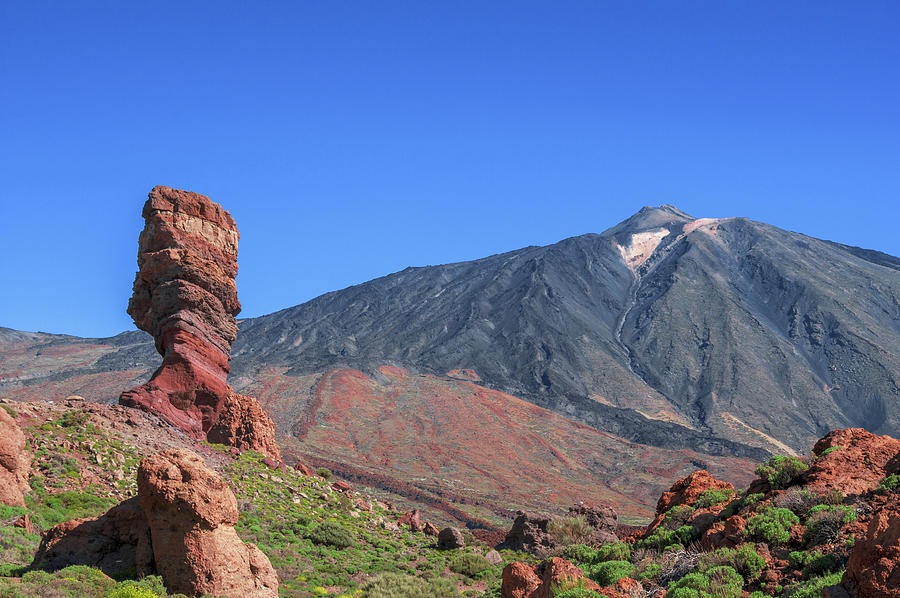 Roque Cinchado in front of Mount Teide Photograph by Sun Travels