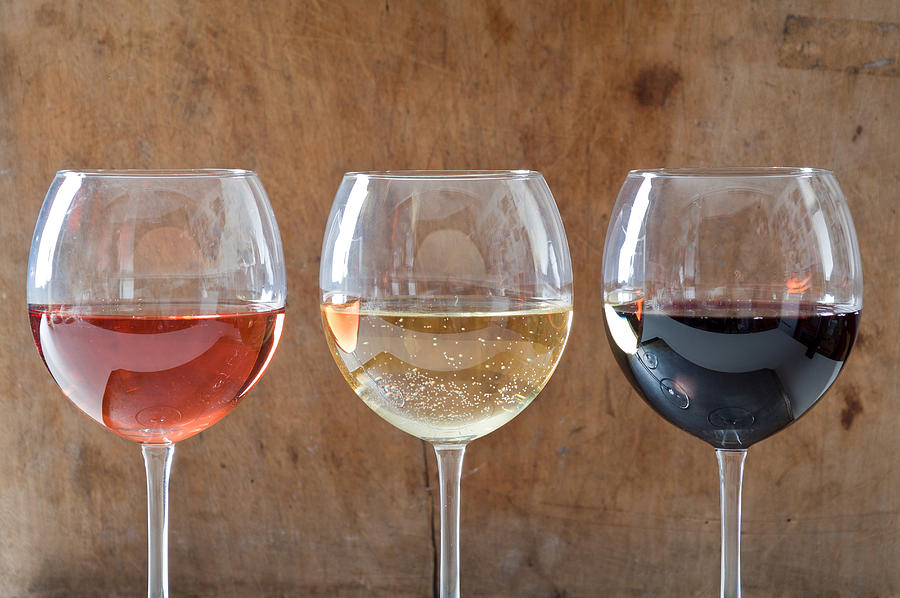 Rose, white and red wines in glasses Photograph by Image Source