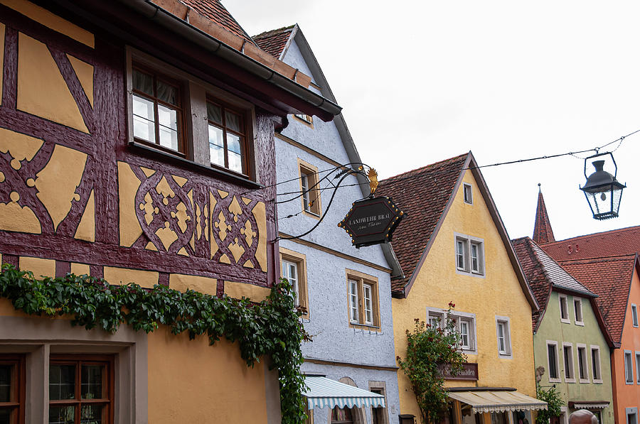 Rothenburg ob der Tauber. Houses of  Spitalgasse Street Photograph by Jenny Rainbow