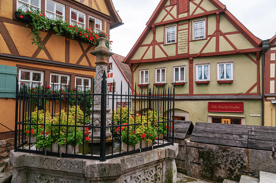 Rothenburg Ob Der Tauber. Little Fountain And Wood Famed Houses On Plonlein 1 Photograph by Jenny Rainbow