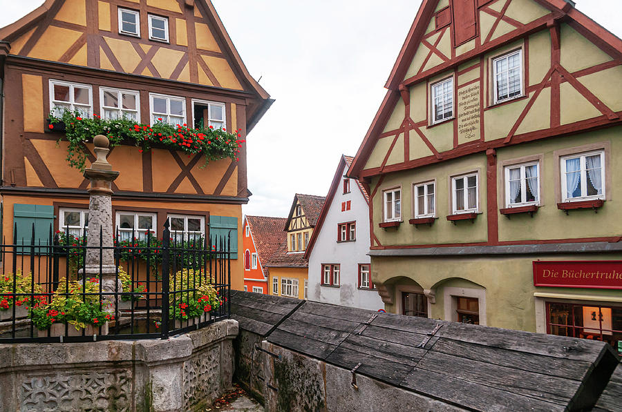 Rothenburg Ob Der Tauber. Little Fountain And Wood Famed Houses On Plonlein 2 Photograph by Jenny Rainbow