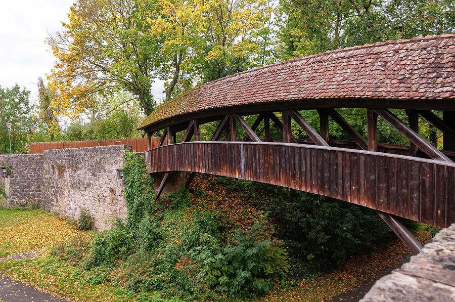 Rothenburg Ob Der Tauber. Old Wooden Covered Bridge 1 Photograph by Jenny Rainbow