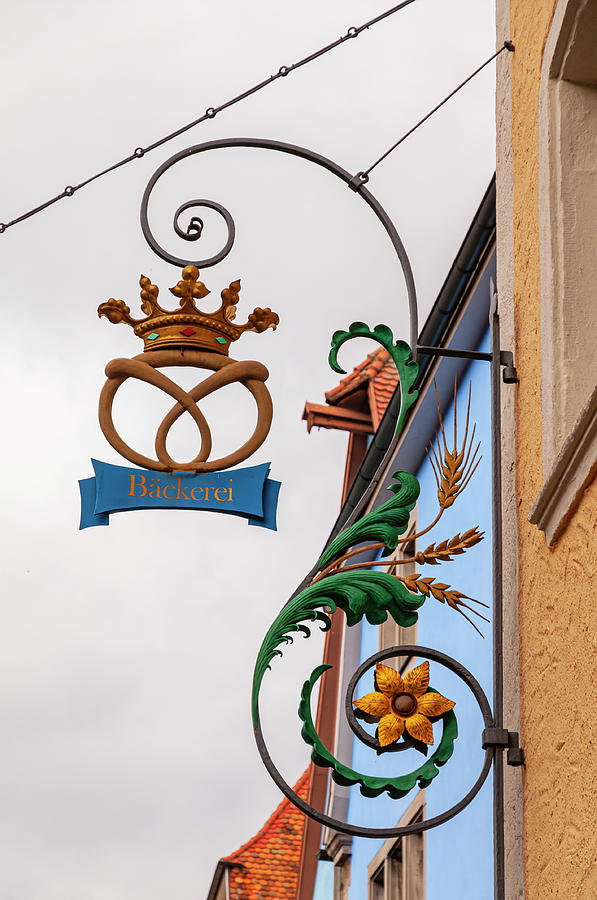Rothenburg Ob Der Tauber. Plonlein Street Forged Signs 2 Photograph by Jenny Rainbow