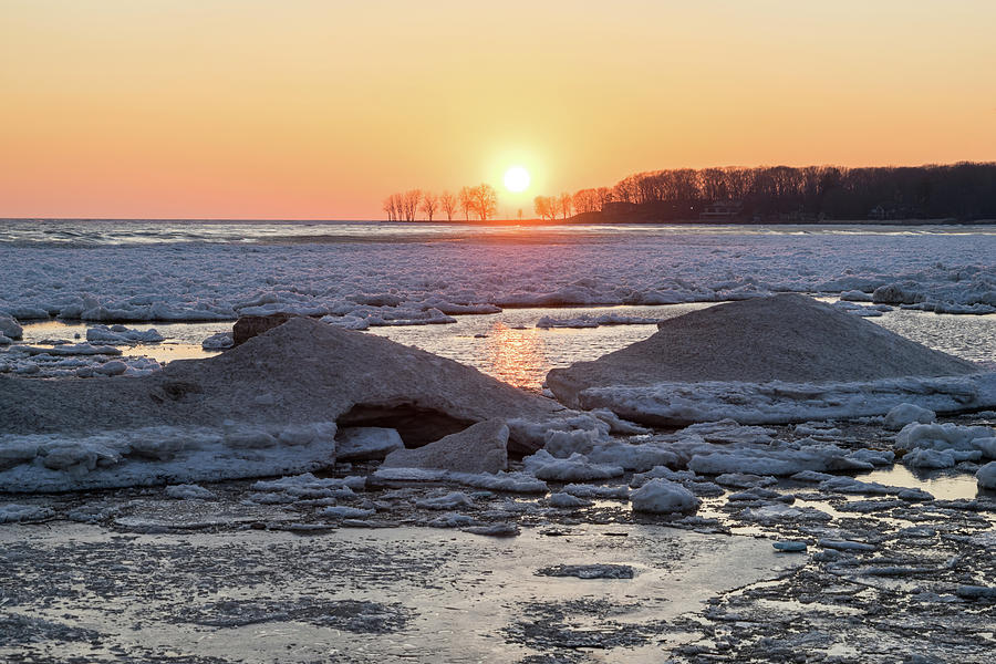 Rough Ice Floes Sunset on Lake Erie at Welland Canal Photograph by Georgia Mizuleva
