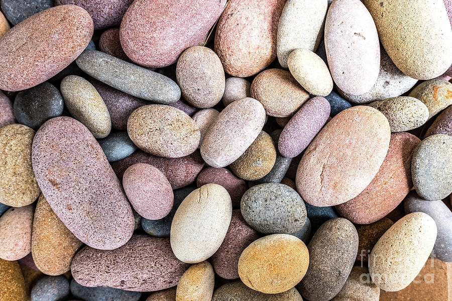 Abstract Photograph - Round beach rocks to decorate the home. by Joaquin Corbalan