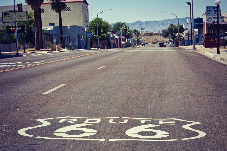 Route 66 road sign in perspective Photograph by Tatiana Travelways