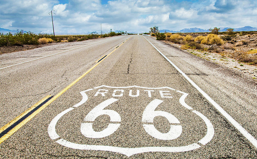 Route 66 road sign with blue sky background. Classic concept for ...