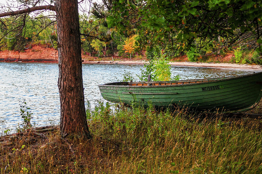 Row boat in Fall Photograph by James McClintock