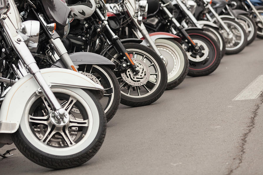 Row Of Motorcycles Parked On A Street Photograph