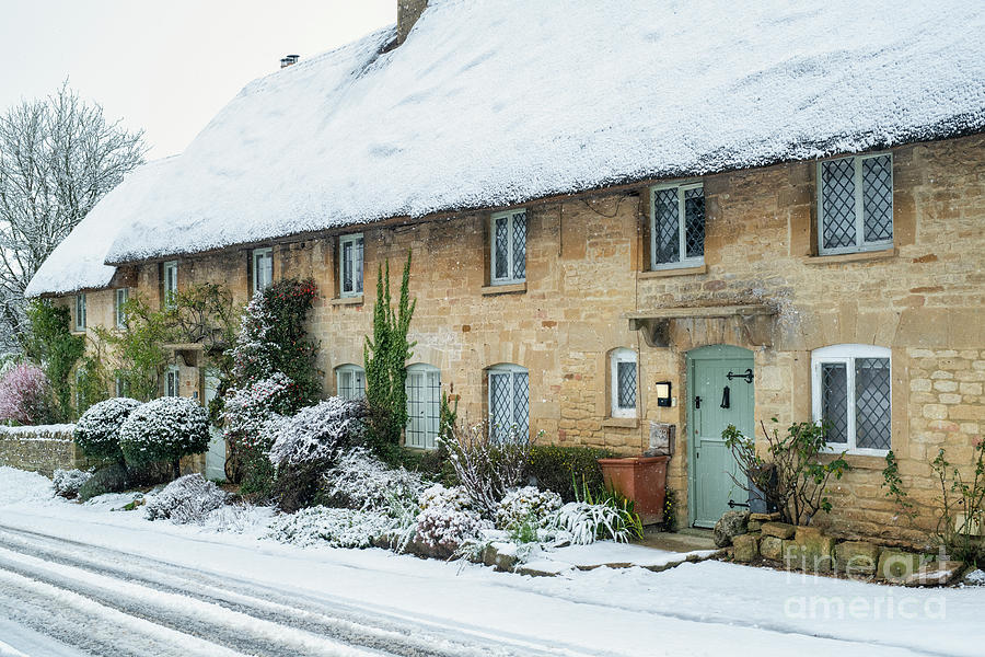 Row of Thatched Cottages in the Snow Taynton Cotswolds Photograph by Tim Gainey