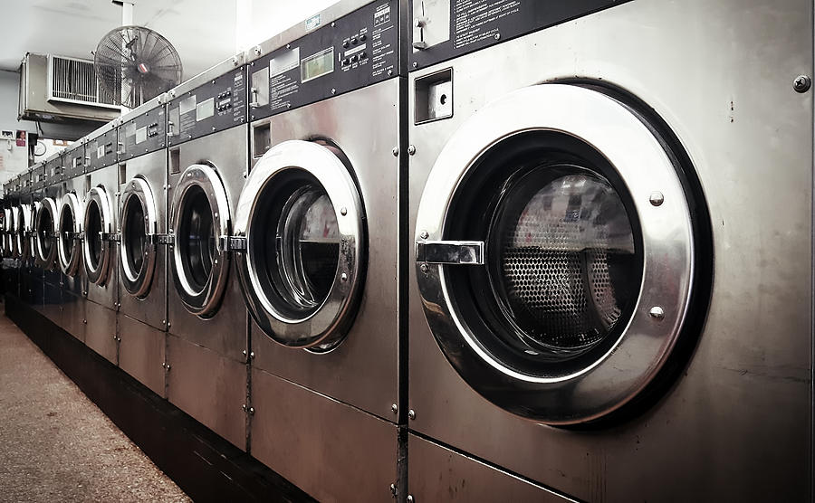 Row of washers in laundromat in Brooklyn, New York City, USA Photograph by Busà Photography
