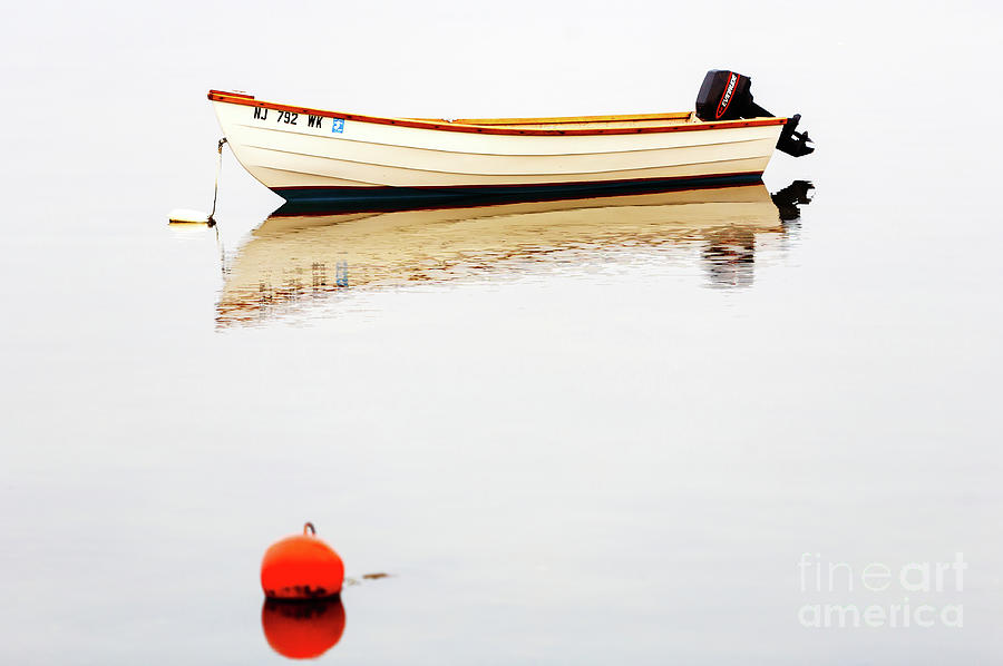 Rowboat in the Beach Haven Bay Photograph by John Rizzuto