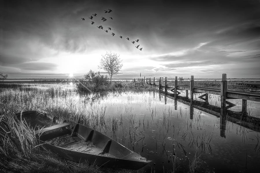 Rowboat in the Marsh at Sunset in Black and White Photograph by Debra and Dave Vanderlaan